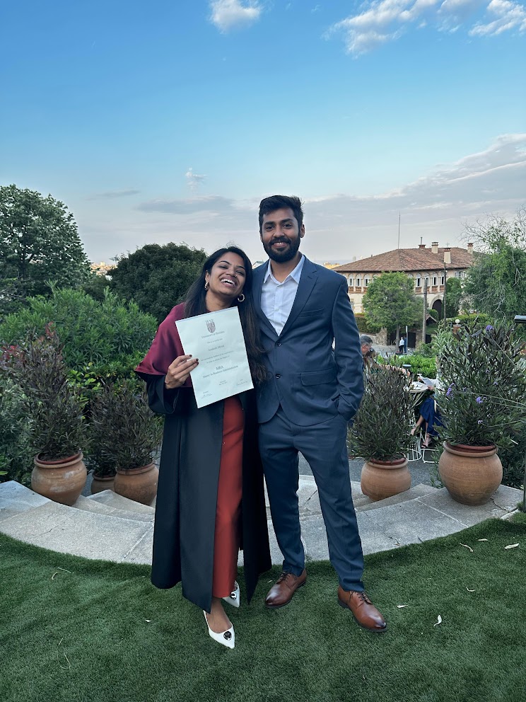 Anukshi in graduation robes in Barcelona, 2025